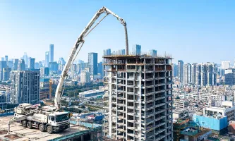 Concrete pump boom on high-rise pour